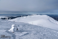 To the summit. Rila and Vitosha mountains are visible on the left
